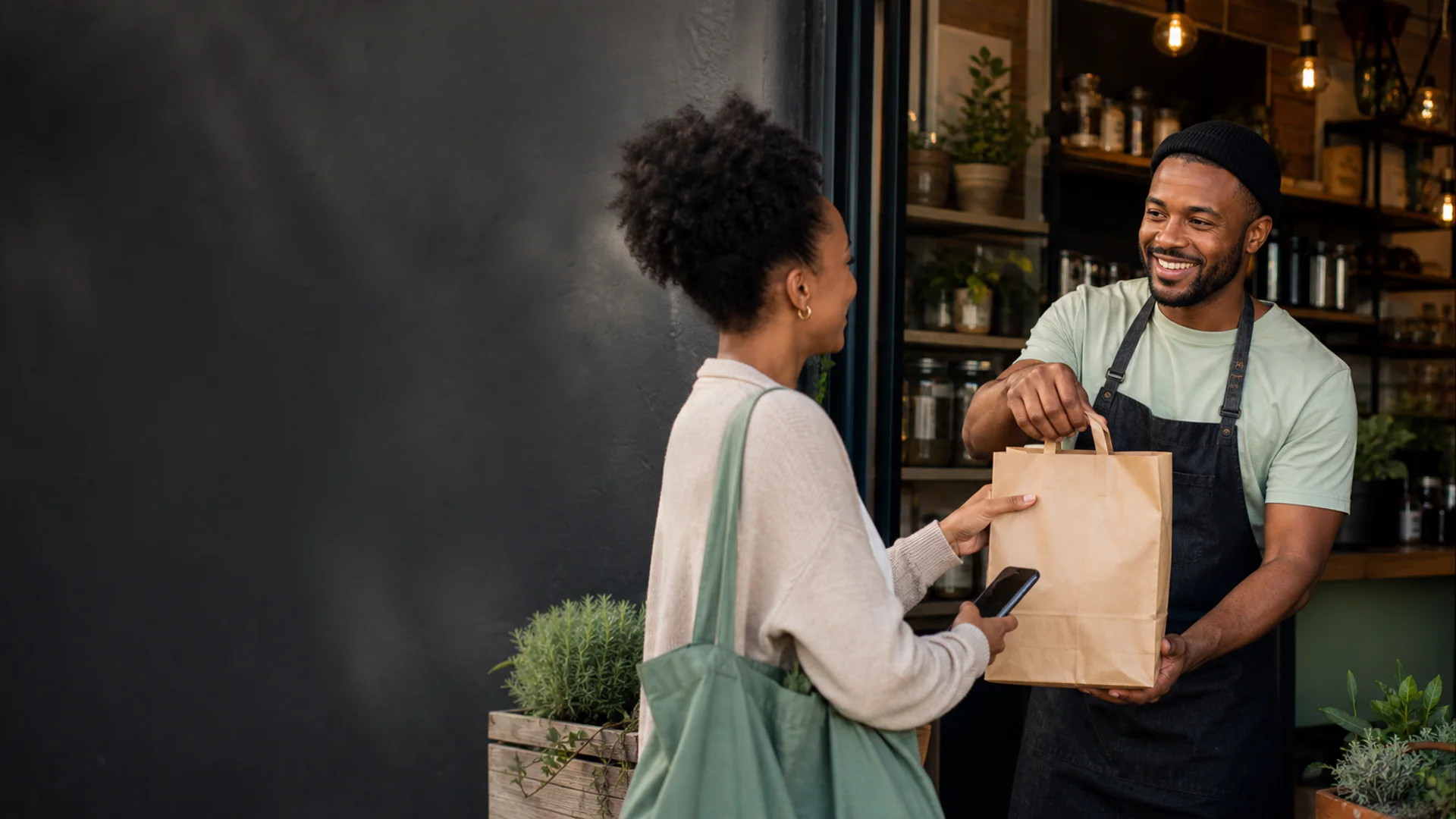 Returning customer collecting an order from a trusted local merchant